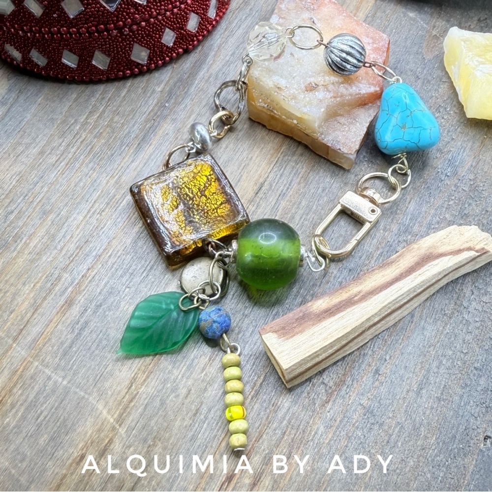 Charms adorned bracelet turquoise  CHUNKY TASSELS